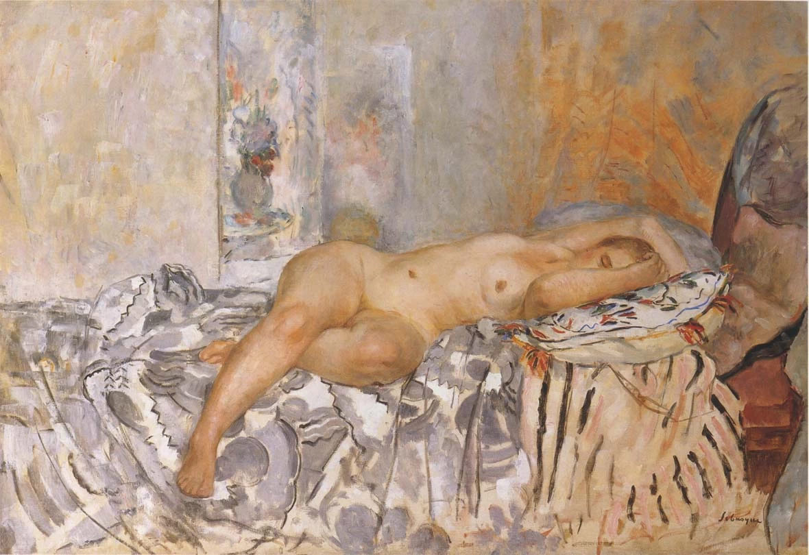Nudo addormentato sul letto